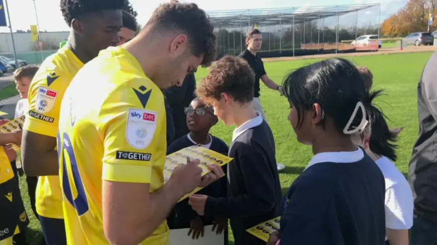 Students' Excitement at Football Team Surprise